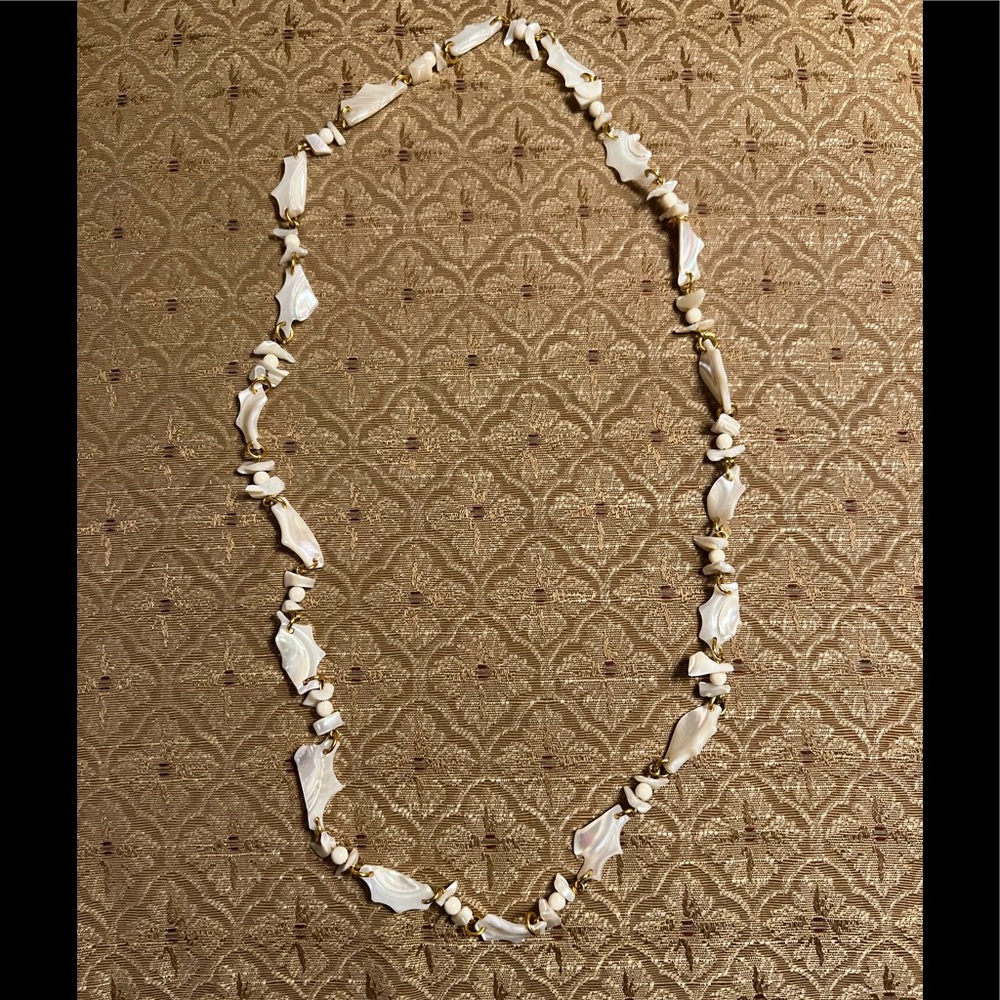 Vintage 34” white mother of pearl necklace with gold findings